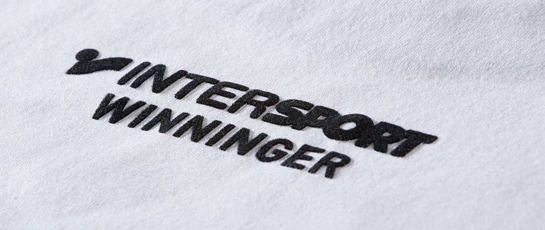 INTERSPORT_Winninger_Stick_Logo_fLOCK_Transfer